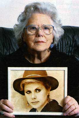Jean MacColl with photo of Kirsty